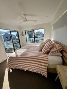 Ένα ή περισσότερα κρεβάτια σε δωμάτιο στο Seaside heaven family friendly