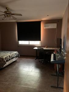 TV a/nebo společenská místnost v ubytování Alquiler Temporal Santa Fe