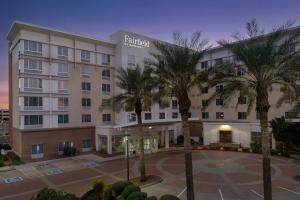 a rendering of a hotel with palm trees in front at Fairfield Inn and Suites Phoenix Chandler Fashion Center in Chandler