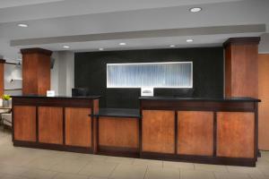 a lobby with a bar in a hospital at Fairfield Inn and Suites Phoenix Chandler Fashion Center in Chandler