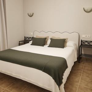 En eller flere senge i et værelse på Villa Aemilius Hotel Rural a 10 min de Mérida + 28 billeder