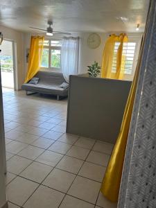 Ένα ή περισσότερα κρεβάτια σε δωμάτιο στο Évasion Soleil