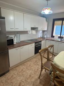 Kuchyň nebo kuchyňský kout v ubytování Los Palmeros