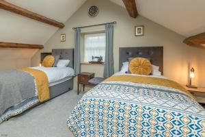 Ένα ή περισσότερα κρεβάτια σε δωμάτιο στο Eiddior