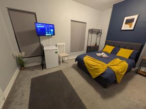 Ένα ή περισσότερα κρεβάτια σε δωμάτιο στο Stay Sleep Rest - Lonsdale