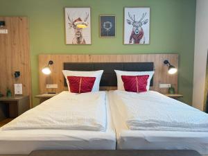 Ένα ή περισσότερα κρεβάτια σε δωμάτιο στο Appartement Deluxe Winterzauber nahe Europa Park