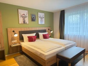 Ένα ή περισσότερα κρεβάτια σε δωμάτιο στο Appartement Deluxe Winterzauber nahe Europa Park