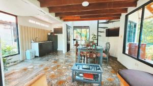 TV a/nebo společenská místnost v ubytování cabaña + 9 fotografií