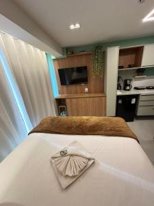 Kuchyň nebo kuchyňský kout v ubytování Melhores Flats - Seu desejo, pé na areia