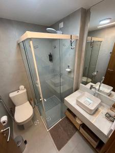 Koupelna v ubytování Melhores Flats - Seu desejo, pé na areia + 41 fotografií