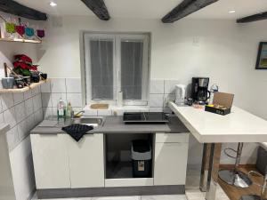 Η κουζίνα ή μικρή κουζίνα στο Cosy home