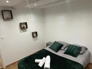 Ένα ή περισσότερα κρεβάτια σε δωμάτιο στο Cosy home