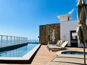 La alberca dentro o cerca de CURTA!|216|Brava Arts|2 Suítes| Sofisticada Vista