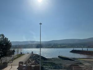 a view of a body of water with a street light at Aurora House 2B Warrenpoint in Newry