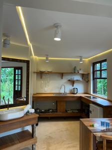 Køkken eller tekøkken på Studio Com Hidro Para Casais - Baobá Suítes - 05