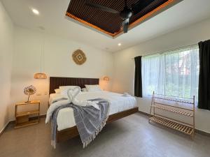 Ένα ή περισσότερα κρεβάτια σε δωμάτιο στο Casa Oruro - Pinilla Highlands