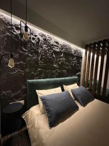 En eller flere senge i et værelse på Къща за гости Рилски чардак