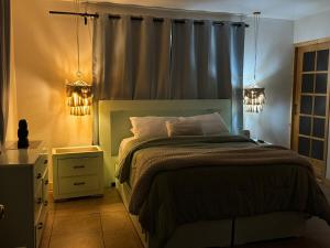 En eller flere senge i et værelse på Casa Amar, Near of US Border and Consulate