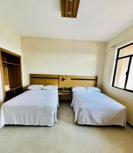 Postel nebo postele na pokoji v ubytování Hotel Calvete + 22 fotografií