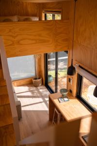 a view of the living room of a tiny house at Whittle Home - NEW TINY HOME in Robe