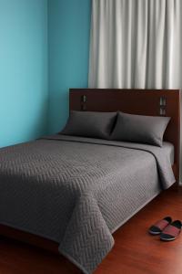 Postel nebo postele na pokoji v ubytování Hotel Bolivar