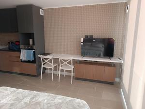 Kuchyň nebo kuchyňský kout v ubytování Icono studio + 2 fotografie