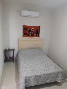 Ένα ή περισσότερα κρεβάτια σε δωμάτιο στο Linda Goya +2 φωτογραφίες