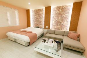 Postel nebo postele na pokoji v ubytování Hotel Aqua Vitae (Adult Only)