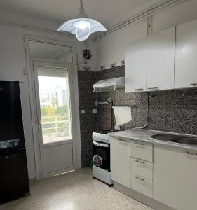 Η κουζίνα ή μικρή κουζίνα στο Coquette-Appart