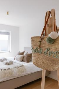 Giường trong phòng chung tại Vakantiewoning Sable Dor