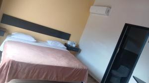 Ένα ή περισσότερα κρεβάτια σε δωμάτιο στο Hotel D'bamboo