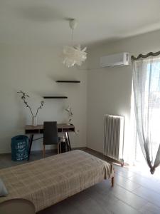 Ένα ή περισσότερα κρεβάτια σε δωμάτιο στο Brillarooms