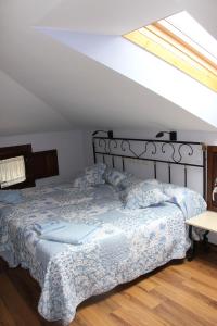 Postel nebo postele na pokoji v ubytování La Cantina del Tobero