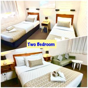 zwei Betten in einem Hotelzimmer mit zwei Betten in der Unterkunft Tartan Motel, Yea in Yea