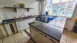 Kuchyň nebo kuchyňský kout v ubytování Pousada Vitória