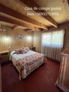 Ένα ή περισσότερα κρεβάτια σε δωμάτιο στο casa de campo punta nao +6 φωτογραφίες