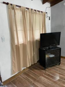 TV a/nebo společenská místnost v ubytování Casa de verano