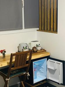 Nhà bếp/bếp nhỏ tại L'Isménia, L'écrin Zen