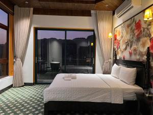 Ένα ή περισσότερα κρεβάτια σε δωμάτιο στο Tam coc MrHieu homestay +94 φωτογραφίες