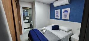 Ένα ή περισσότερα κρεβάτια σε δωμάτιο στο Apartamento São Paulo Tatuapé +99 φωτογραφίες