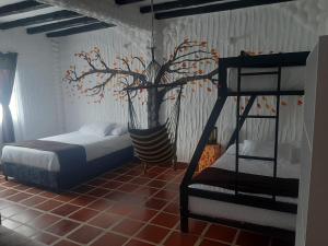 Postel nebo postele na pokoji v ubytování Villa Luisa