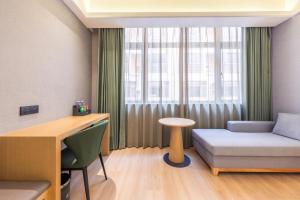 Χώρος καθιστικού στο 秋果酒店 东莞长安天地无限商务大厦店