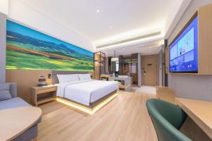 Μια τηλεόραση ή/και κέντρο ψυχαγωγίας στο 秋果酒店 东莞长安天地无限商务大厦店