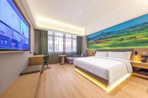 Μια τηλεόραση ή/και κέντρο ψυχαγωγίας στο 秋果酒店 东莞长安天地无限商务大厦店