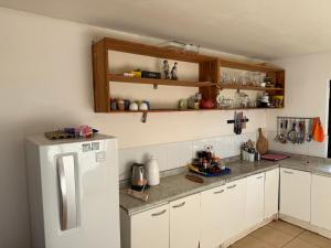 Η κουζίνα ή μικρή κουζίνα στο Cabañas Refugio Arqueologico