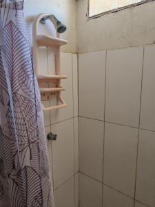 a shower with a shower curtain in a bathroom at Villa Naylamp loft7 playa pocitas in Puerto Máncora +28 photos