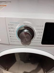 a close up of a washing machine with a control panel at Reñaca, Vista Increíble! in Viña del Mar