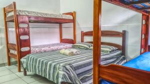 Postel nebo postele na pokoji v ubytování Pousada Vitória