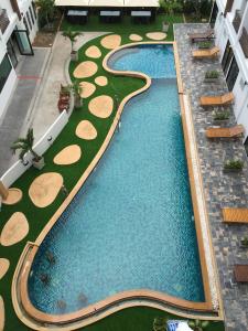an overhead view of a swimming pool at a resort at Baan Sang Singh in Chiang Mai