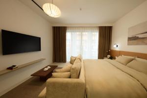 Μια τηλεόραση ή/και κέντρο ψυχαγωγίας στο Lens Stay